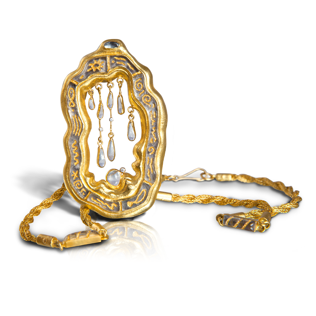 22k Gold necklace with decorative pendant on white background