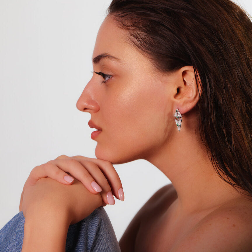 Marilisi artisan fine jewelry White gold diamonds green emerald symmetrical art deco Latch Back earrings front side Latch Back On the Model