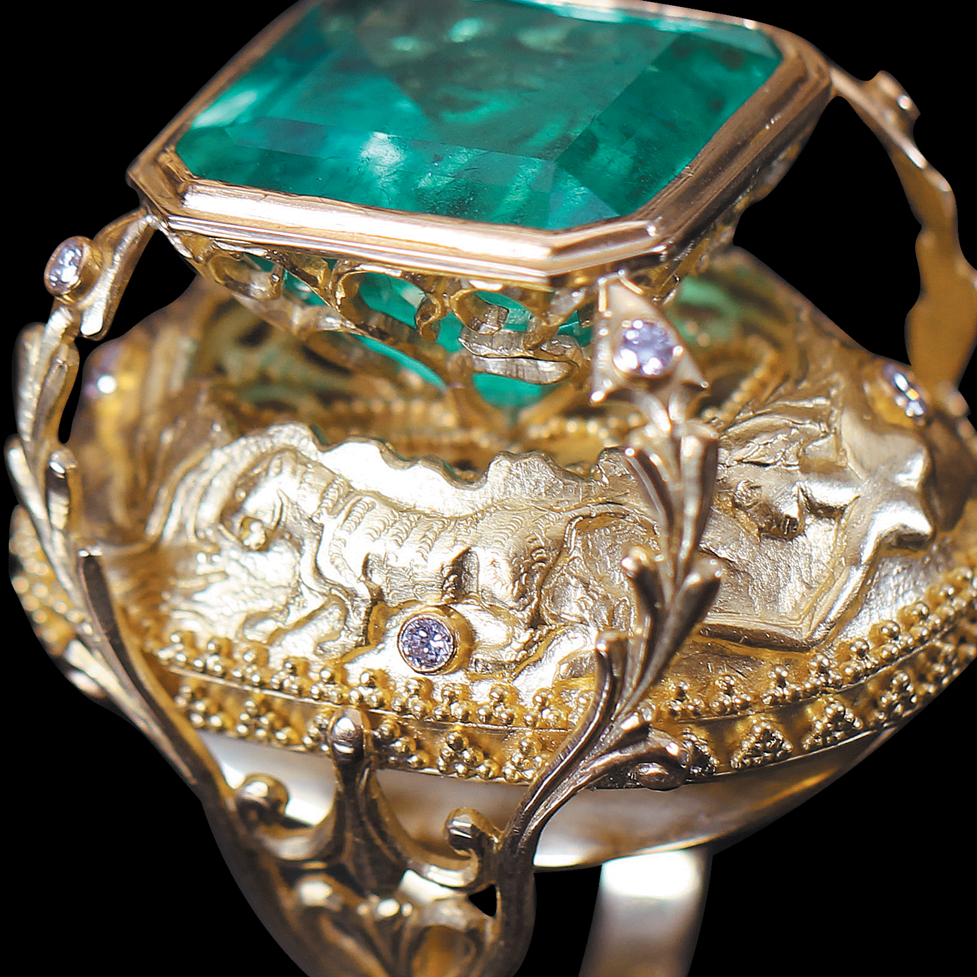 Handcrafted and sculpted ring with beautiful green emerald from Marilisi Jewelry House