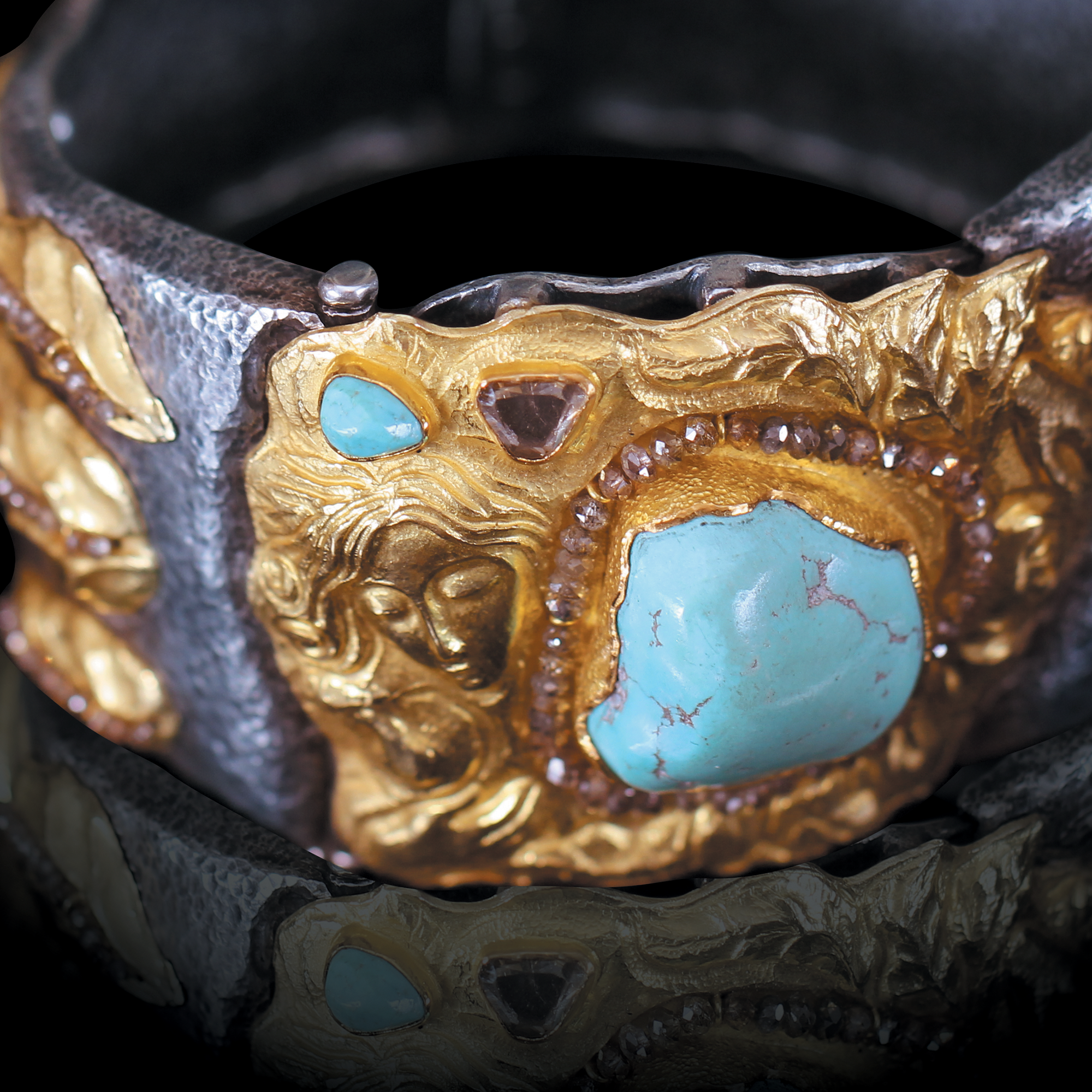 Beautiful hand sculpted and handcrafted bracelet in gold adorned with turquoise and diamonds for collectors and art lovers