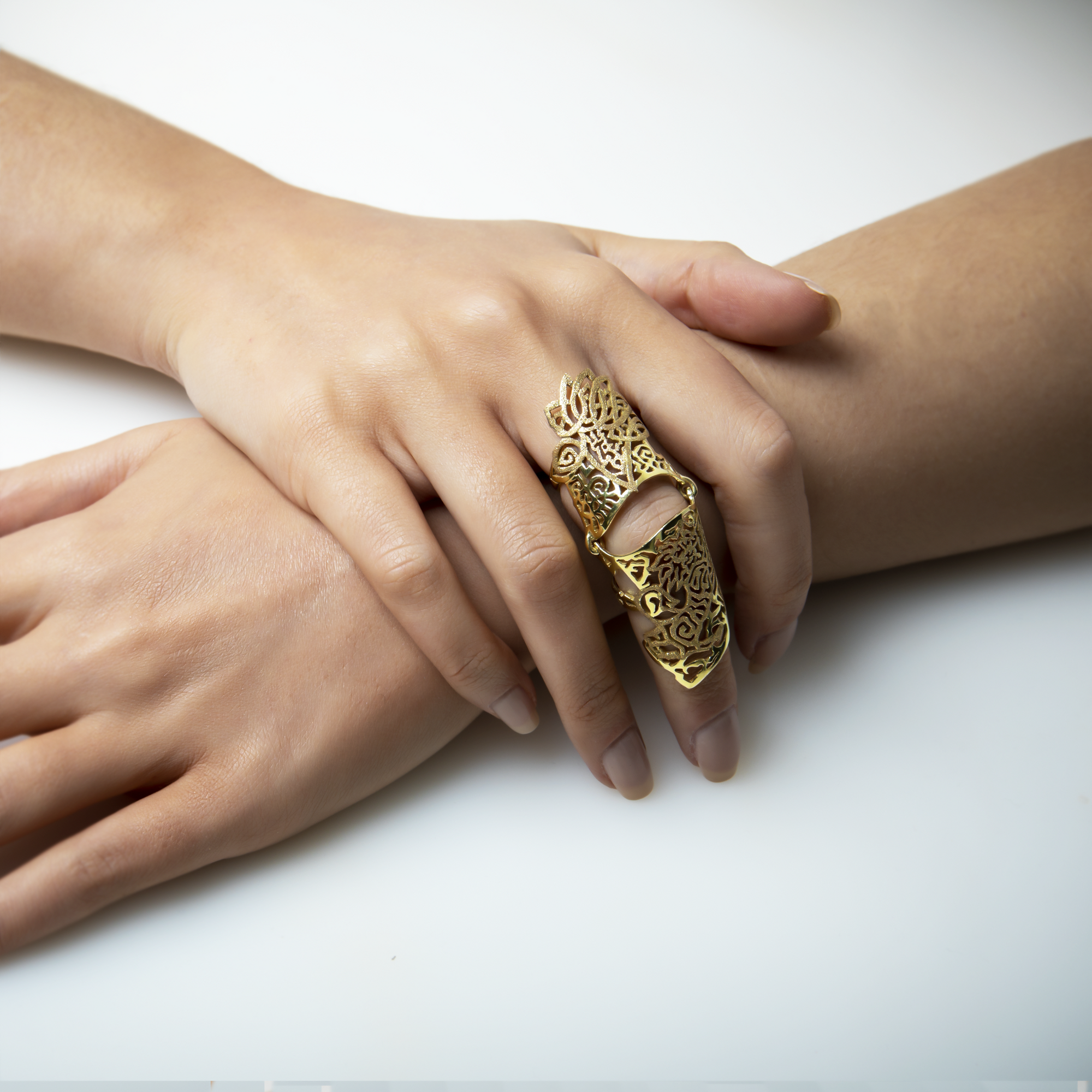 Marilisi artisan fine jewelry Yellow Gold armor ring depicting Aztec ruler and lion above