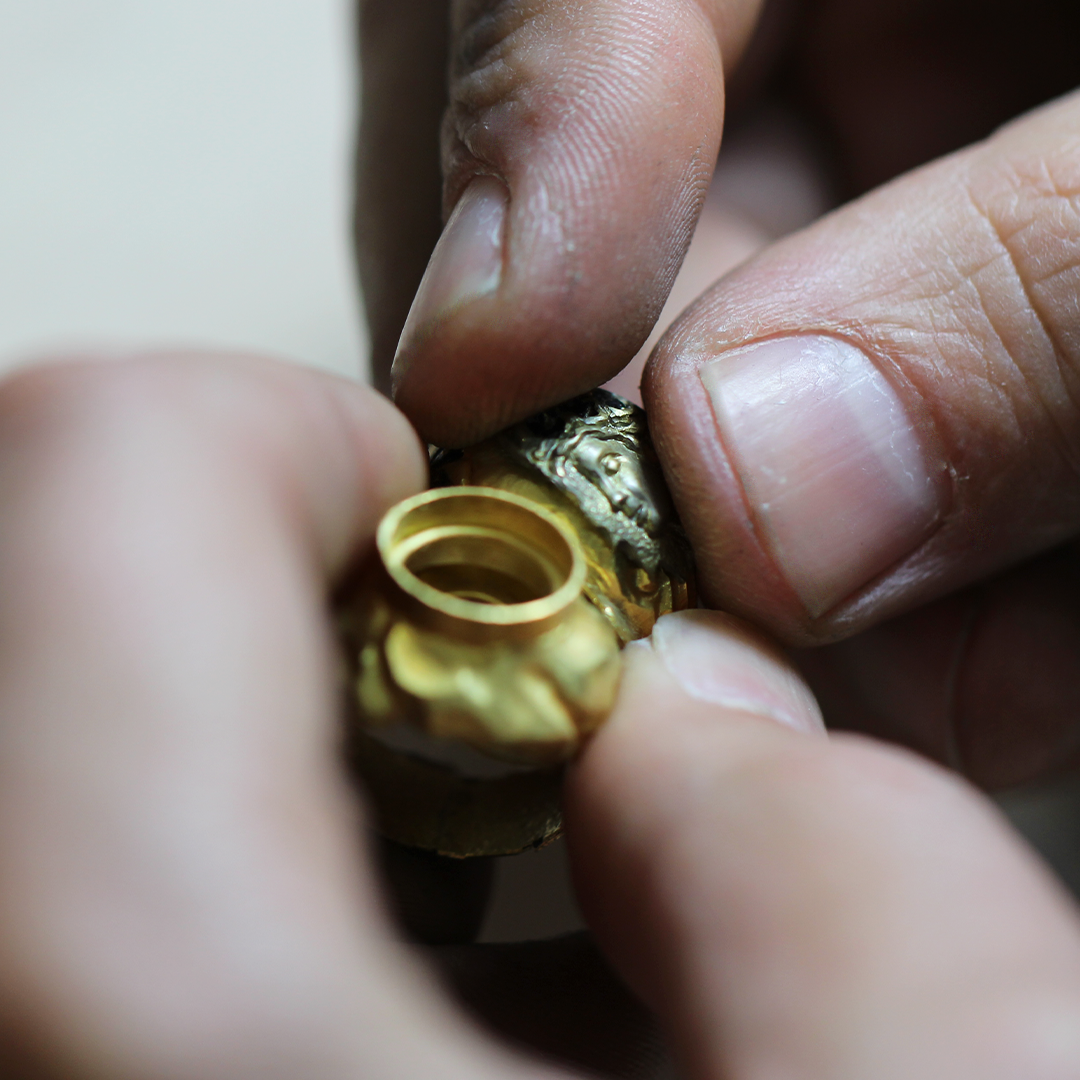 Close up of Marilisi artisan working on a bespoke gold ring