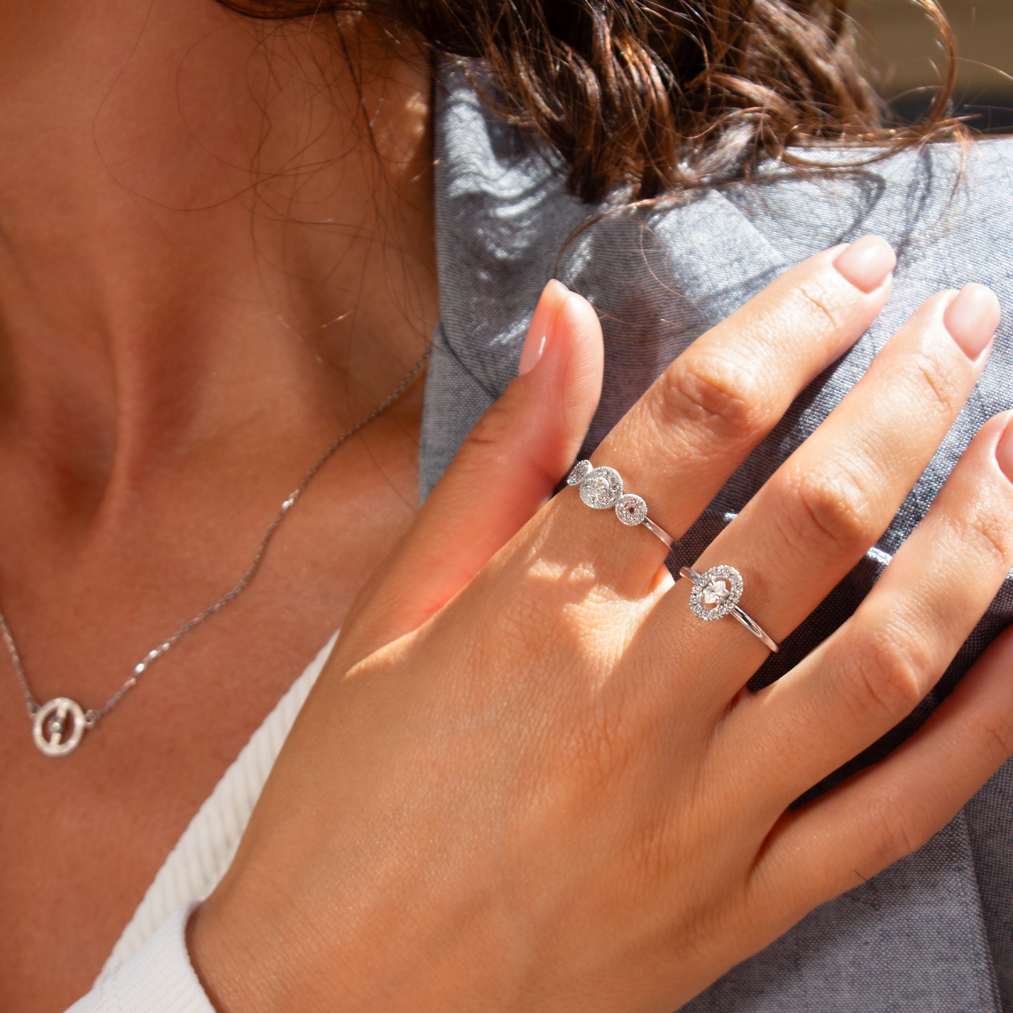 Close-up of a hand wearing a marilisi diamond ring